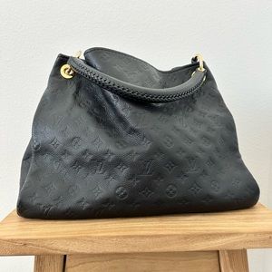 Louis Vuitton Artsy MM Monogram Empreinte embossed leather handbag and dust bag.